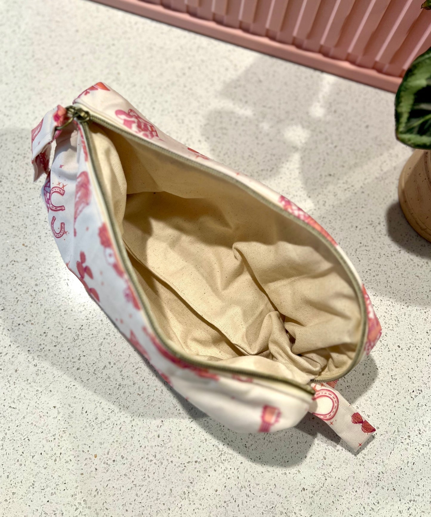 Pink cowgirl pouch with zipper, handmade for tools or art supplies.