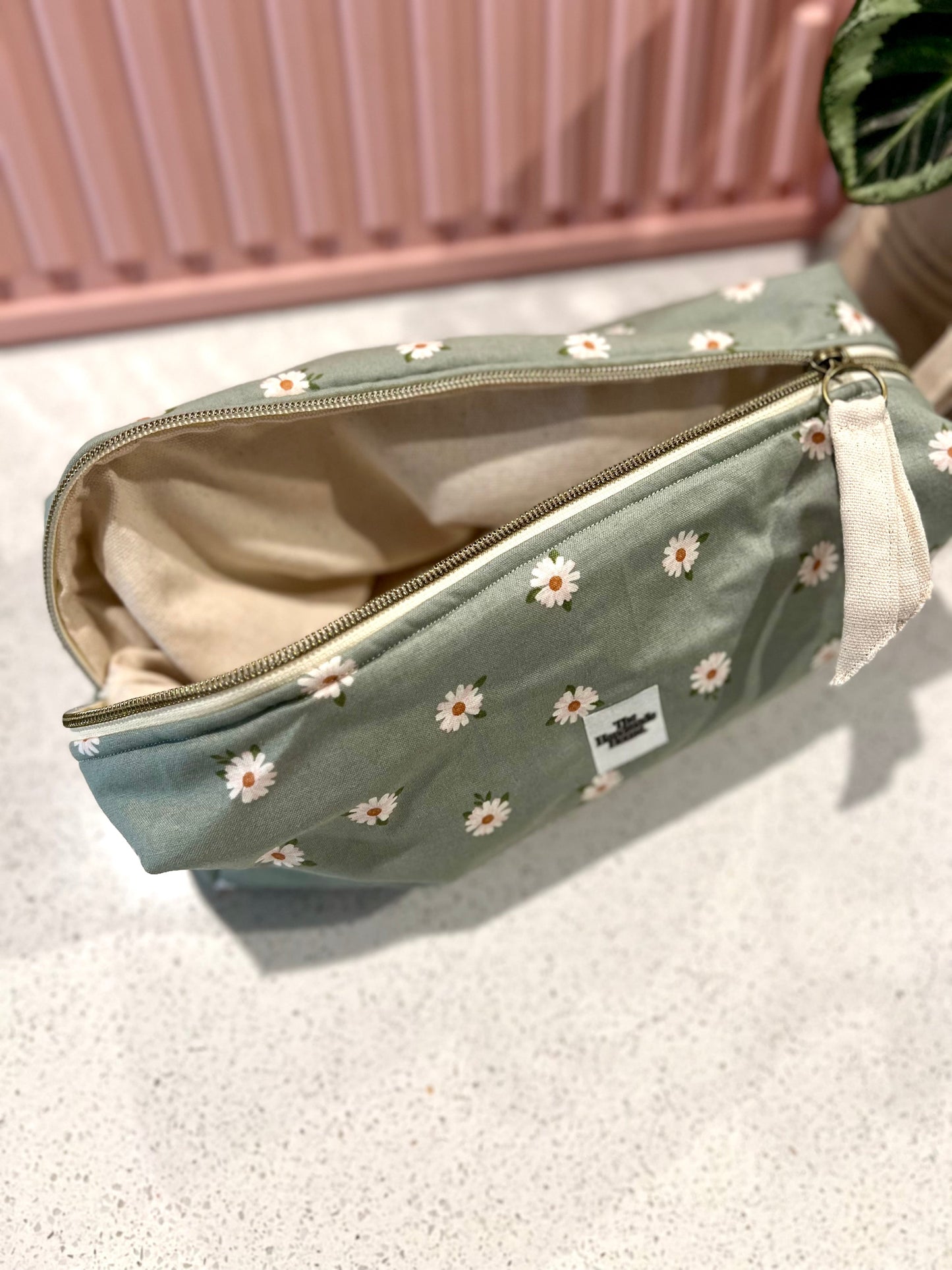 Handmade flower pouch with zipper, ideal for hair tools or craft supplies.