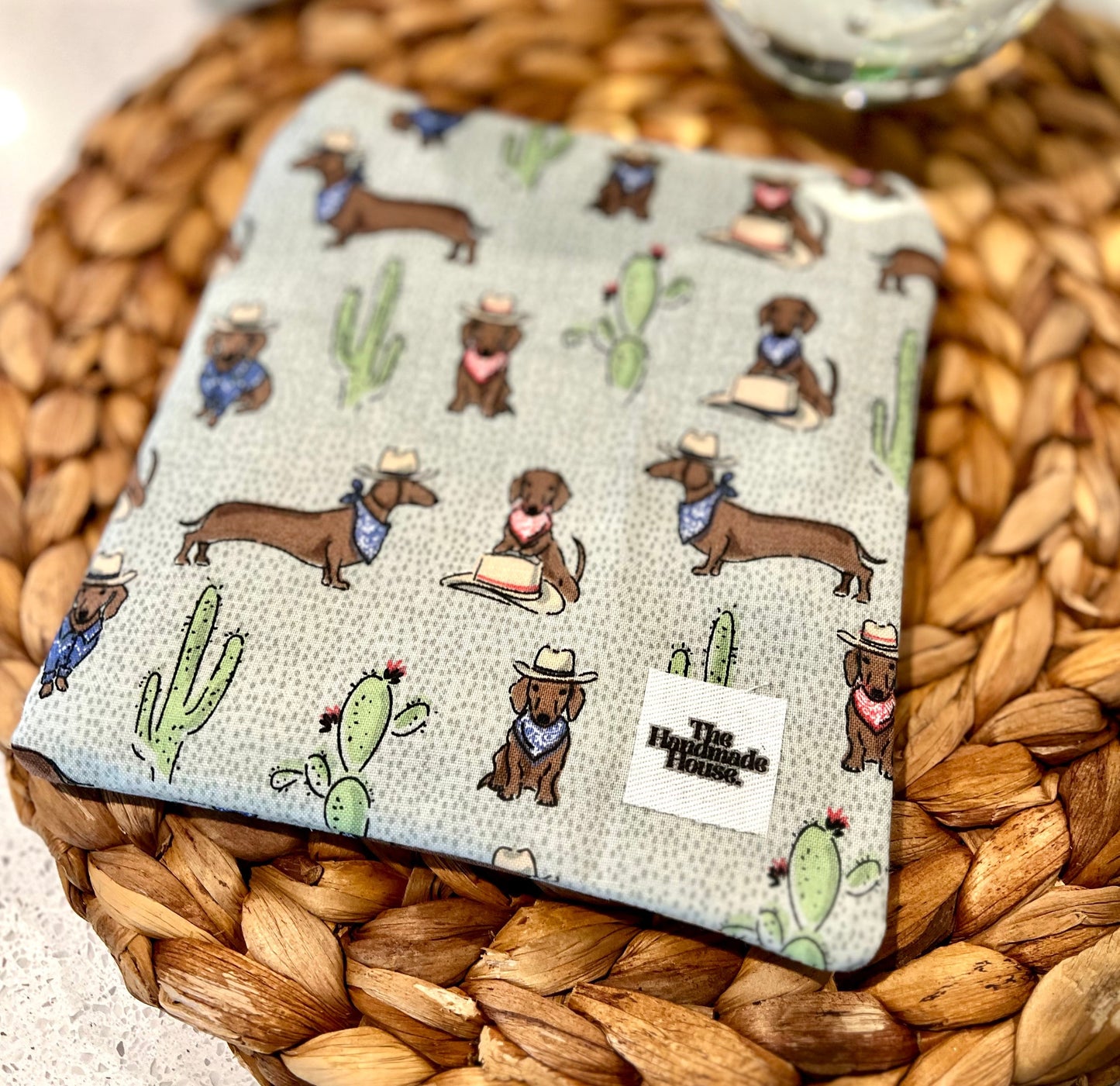 Handmade cotton Dachshund mini pouch with dog and cactus print, size 6x6 inches.