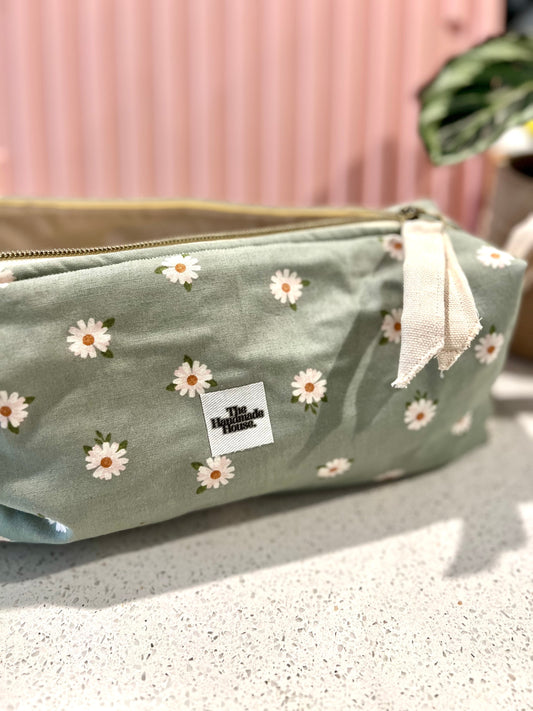 Handmade flower pouch with zipper closure, ideal for hair tools or art supplies.