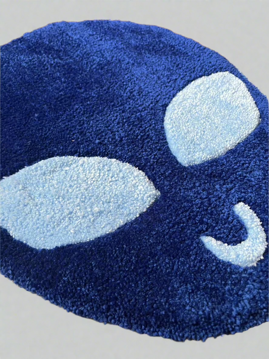 Blue Alien rug ready to ship, blue design with light blue features.