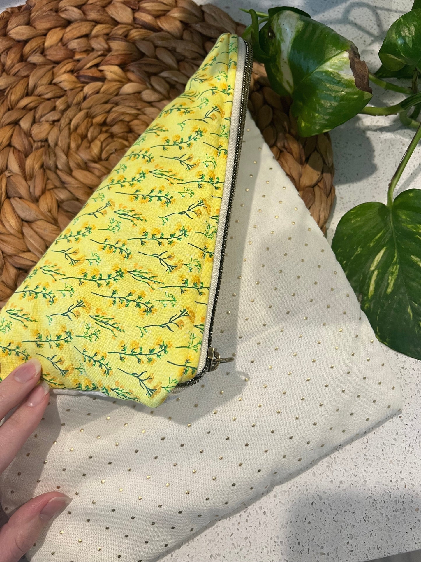 Handmade yellow flower large book sleeve with quilted cotton and zipper closure.