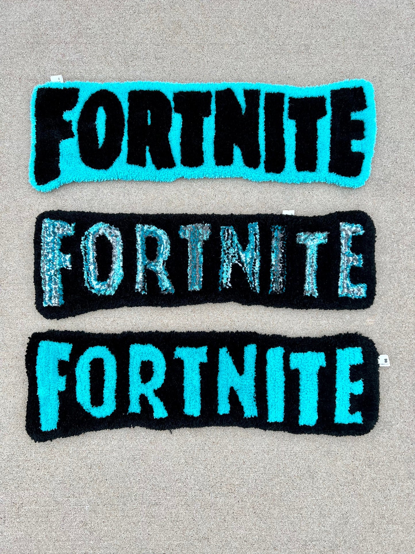 Fortnite rug in black and teal, size 26x7.5 inches, customizable colors available.
