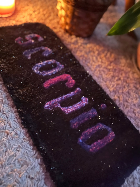 Custom zodiac sign mat with "Scorpio" in vibrant colors, size 21inx9in.