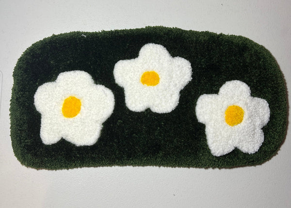 Flower garden computer mat with white daisy design.