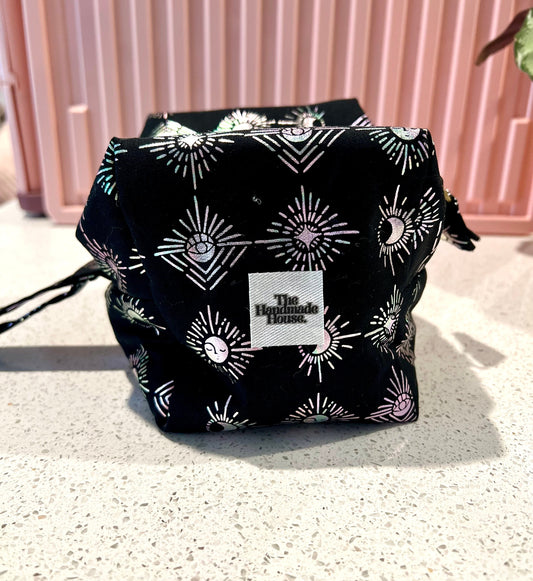 Witchy Pouch with mystical design, handmade with zipper closure, ideal for makeup and art supplies.