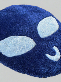 Blue Alien rug ready to ship, blue design with light blue features.