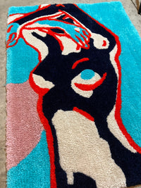Colorful abstract design on the "Drop 3: Body Rug", 25x25 size.
