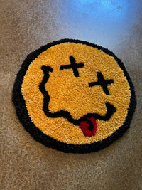 Classic Smiley Face rug, 12x12, colorful woven design.