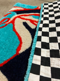 Drop 3 Body Rug, 25x25, vibrant abstract design with checkerboard pattern.