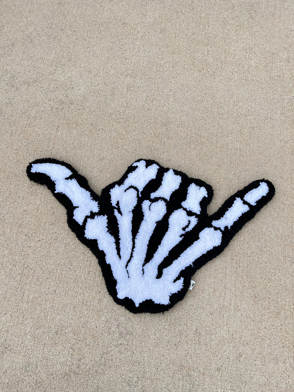 Hang Loose Skeleton Hand design in black and white, 26x16 inches.